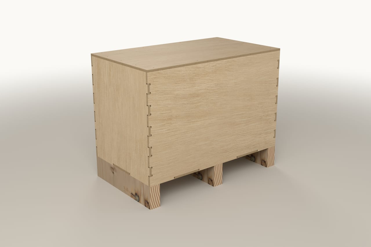 Reference flat-pack plywood crate 688 x 402 x 540 mm on three runners, three-quarter view, finger joints visible on the corner